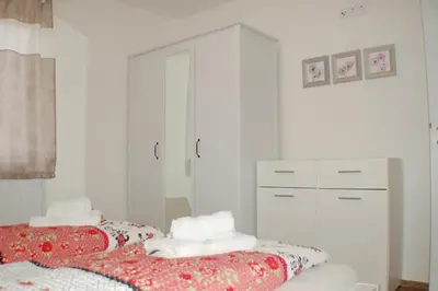 Ein Bett oder Betten in einem Zimmer der Unterkunft Wacholder am Waldsee 1