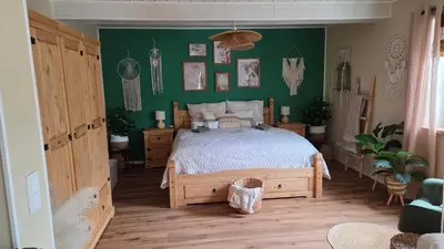 Ein Bett oder Betten in einem Zimmer der Unterkunft FeWo Naturtraum
