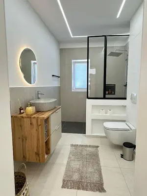 Ein Badezimmer in der Unterkunft Domi Apartment
