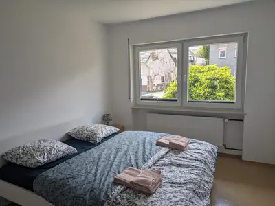 Ein Bett oder Betten in einem Zimmer der Unterkunft Spacious and Luminous Apartment in a Bungalow