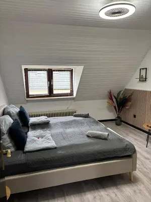 Ein Bett oder Betten in einem Zimmer der Unterkunft Schönes Apartment in der Altstadt