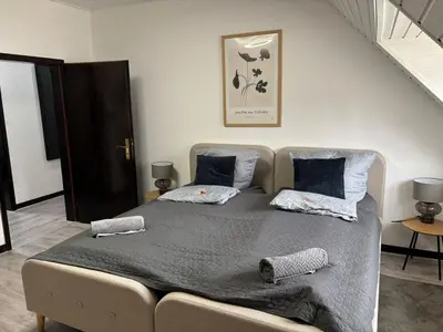 Ein Bett oder Betten in einem Zimmer der Unterkunft Schönes Apartment in der Altstadt