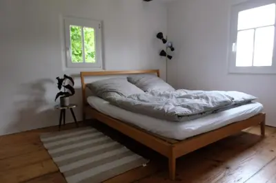 Ein Bett oder Betten in einem Zimmer der Unterkunft Ferienwohnung Fränkischer Hof