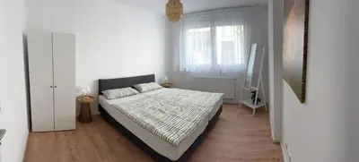 Ein Bett oder Betten in einem Zimmer der Unterkunft Rheingoldnest
