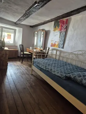 Ein Bett oder Betten in einem Zimmer der Unterkunft Haus Tina