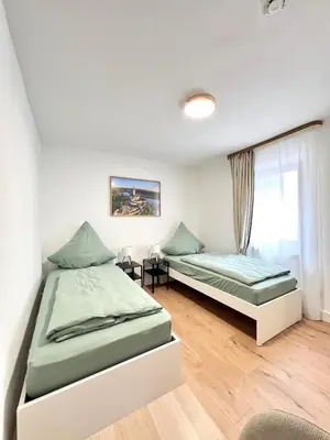 Ein Bett oder Betten in einem Zimmer der Unterkunft Apartment Brunnenstraße in Braubach