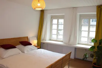 Ein Bett oder Betten in einem Zimmer der Unterkunft Gemütliche Oase