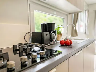 Küche/Küchenzeile in der Unterkunft Holiday Home Tiny Haus Vierseenblick Nummer 4 by Interhome