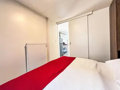 Ein Bett oder Betten in einem Zimmer der Unterkunft Holiday Home Tiny Haus Vierseenblick Nummer 3 by Interhome