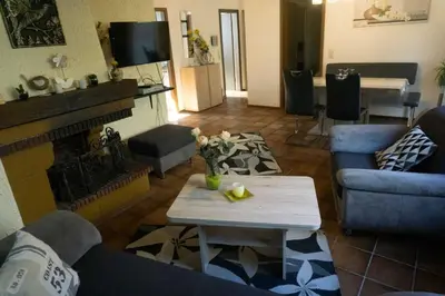 Ein Sitzbereich in der Unterkunft Haus Im Wiesengrund EG