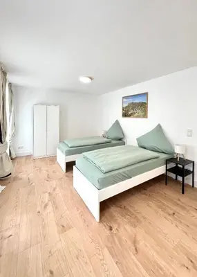 Ein Bett oder Betten in einem Zimmer der Unterkunft Privatzimmer in Apartment Brunnenstraße Braubach