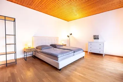 Ein Bett oder Betten in einem Zimmer der Unterkunft Rhein-Haus