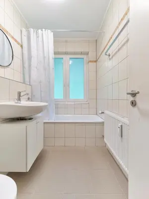 Ein Badezimmer in der Unterkunft Monteurwohnungen in Trier - Parkplatz - Einzelbetten - Waschmaschine und Trockner