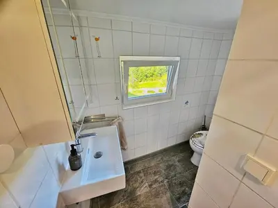 Ein Badezimmer in der Unterkunft Ferienwohnung Waldblick