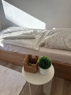 Ein Bett oder Betten in einem Zimmer der Unterkunft Enjoy