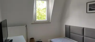 Ein Bett oder Betten in einem Zimmer der Unterkunft Hotel Zur Fähre