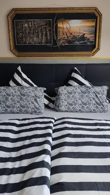 Ein Bett oder Betten in einem Zimmer der Unterkunft Ferienhaus Moselpanorama