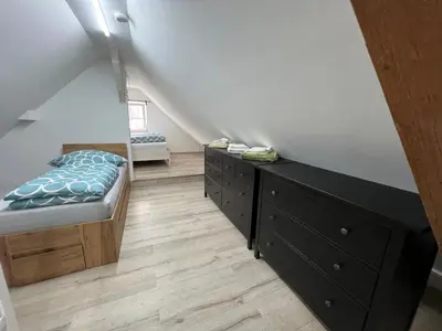 Ein Bett oder Betten in einem Zimmer der Unterkunft Winningen Ferienwohnung Beste Lage Terrasse