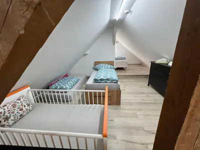 Ein Bett oder Betten in einem Zimmer der Unterkunft Winningen Ferienwohnung Beste Lage Terrasse