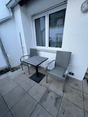 Ein Sitzbereich in der Unterkunft Winningen Ferienwohnung Beste Lage Terrasse