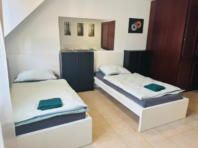Ein Bett oder Betten in einem Zimmer der Unterkunft City Apartment Family & group