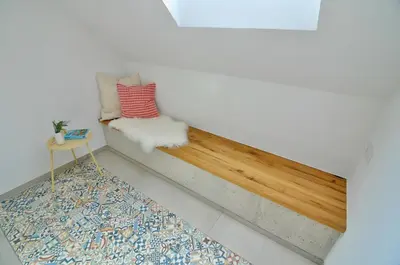 Ein Bett oder Betten in einem Zimmer der Unterkunft Alte Schule - Modernes Oberstübchen