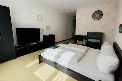 TV/Unterhaltungsangebot in der Unterkunft Helle 2-Zimmer Erdgeschosswohnung mit Terrasse