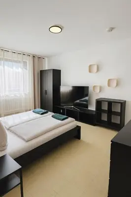 Ein Bett oder Betten in einem Zimmer der Unterkunft Helle 2-Zimmer Erdgeschosswohnung mit Terrasse