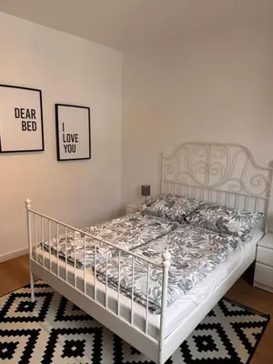 Ein Bett oder Betten in einem Zimmer der Unterkunft Stadtnest Mayen - stilvoll & zentral