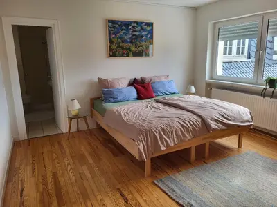 Ein Bett oder Betten in einem Zimmer der Unterkunft Ferienwohnung Bücherkiste