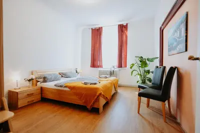 Ein Bett oder Betten in einem Zimmer der Unterkunft Große Altbauwohnung in Boppard für 7 Gäste