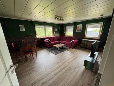 Ein Sitzbereich in der Unterkunft Ferienhaus Feyen