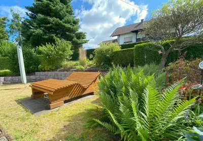 Ein Garten an der Unterkunft Auszeit Ferienhaus Nr 2a