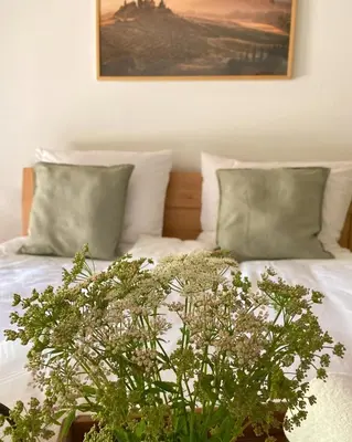 Ein Bett oder Betten in einem Zimmer der Unterkunft Auszeit Ferienhaus Nr 2a