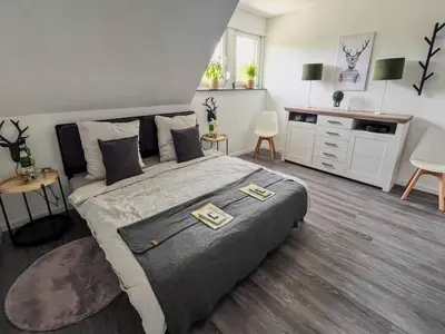 Ein Bett oder Betten in einem Zimmer der Unterkunft Dreamy roof terrace Eifelglück