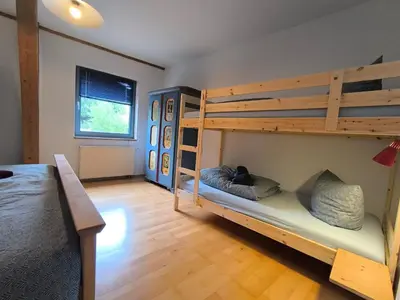 Ein Bett oder Betten in einem Zimmer der Unterkunft Ferienwohnung Vulkanblick -Dein Ruheplatz mitten im Vulkanland