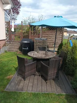 Ein Garten an der Unterkunft FeWo Luna - Wohnen am Tor zum Nationalpark Hunsrück-Hochwald
