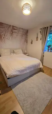 Ein Bett oder Betten in einem Zimmer der Unterkunft FeWo Oahu