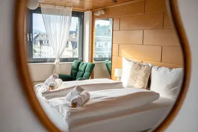 Ein Bett oder Betten in einem Zimmer der Unterkunft City Wohnung am Hbf mit 2 Schlafzimmern und Sky