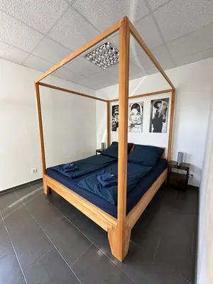 Ein Bett oder Betten in einem Zimmer der Unterkunft Loft Trier-Petrisberg