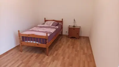 Ein Bett oder Betten in einem Zimmer der Unterkunft Beletage Alte Villa Jünkerath