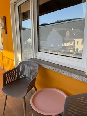 Ein Sitzbereich in der Unterkunft Burgunder Suite