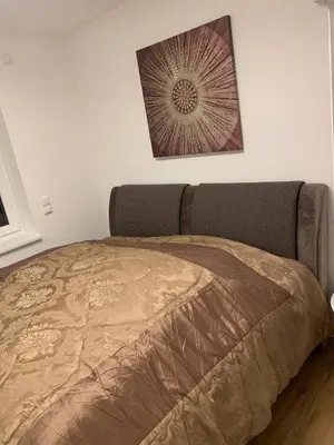 Ein Bett oder Betten in einem Zimmer der Unterkunft Ferienwohnung Muskan