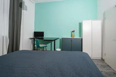 Ein Bett oder Betten in einem Zimmer der Unterkunft Rheinzeit Koblenz