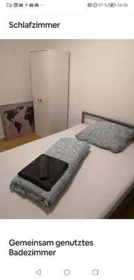 Ein Bett oder Betten in einem Zimmer der Unterkunft Privatroom small 5 min from Railstation