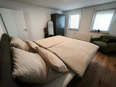 Ein Bett oder Betten in einem Zimmer der Unterkunft FeWo Katharina