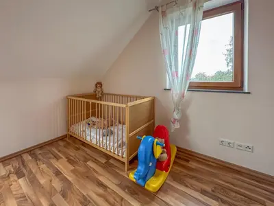 Ein Bett oder Betten in einem Zimmer der Unterkunft Denterhof