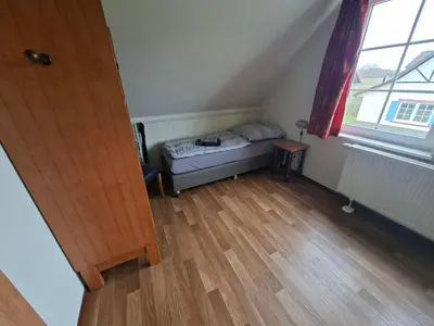 Ein Bett oder Betten in einem Zimmer der Unterkunft Haus am Golfplatz Cochem Mosel