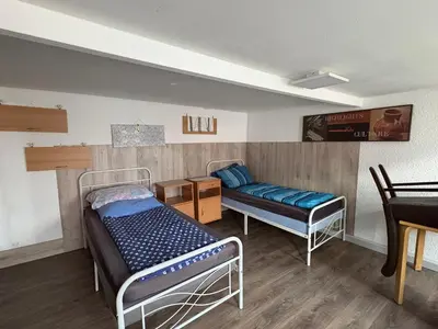 Ein Bett oder Betten in einem Zimmer der Unterkunft Gusenburg B13u Monteur Unterkunft bis 8 Personen