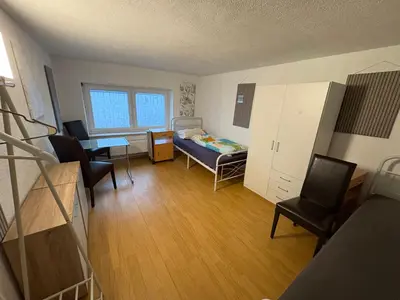 Ein Bett oder Betten in einem Zimmer der Unterkunft Gusenburg B 13o Monteur Wohnung bis 9 Personen